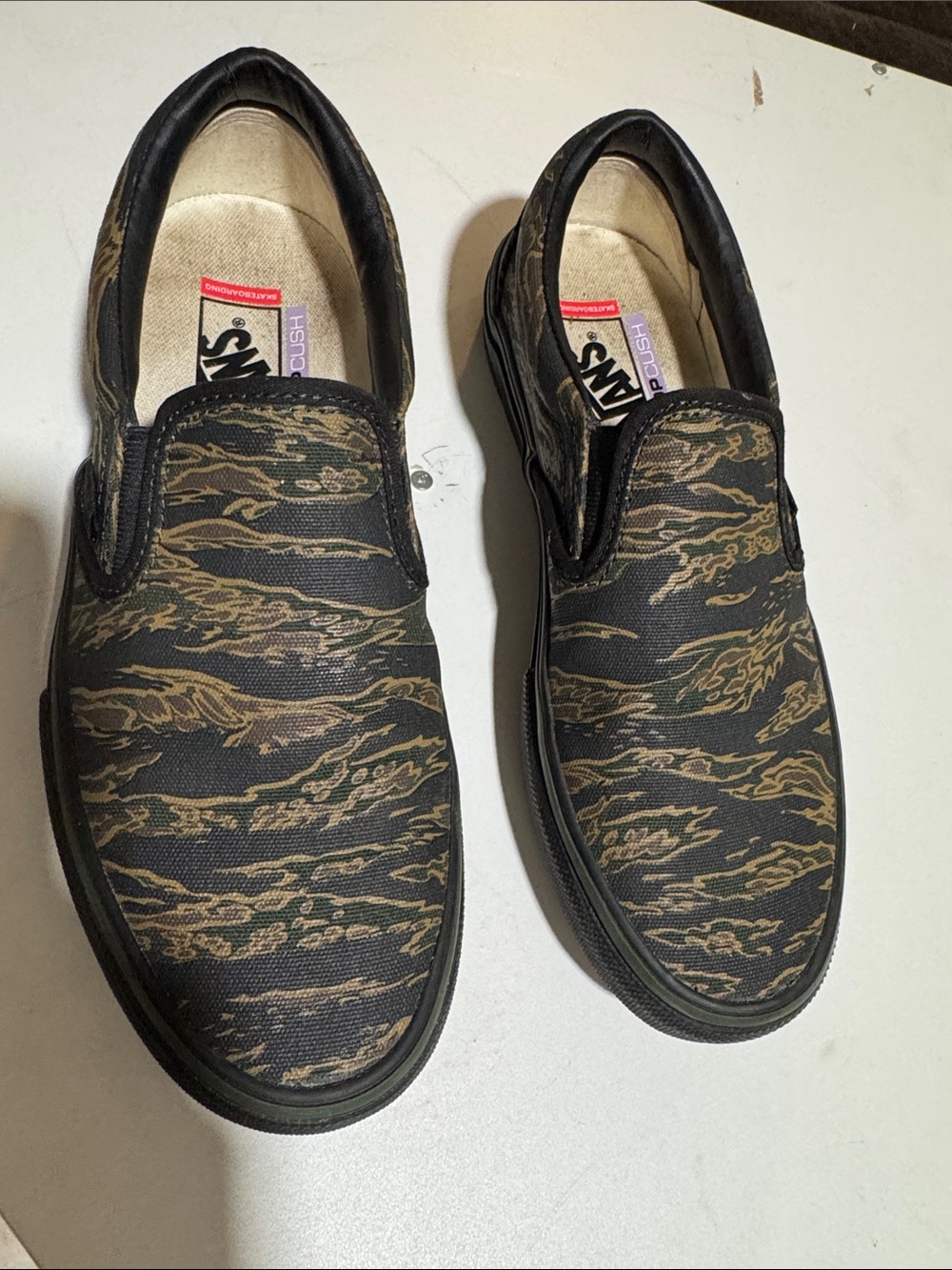 Vans Men’s Slip-On Canvas Shoes in Black and Tan Tigerstripe